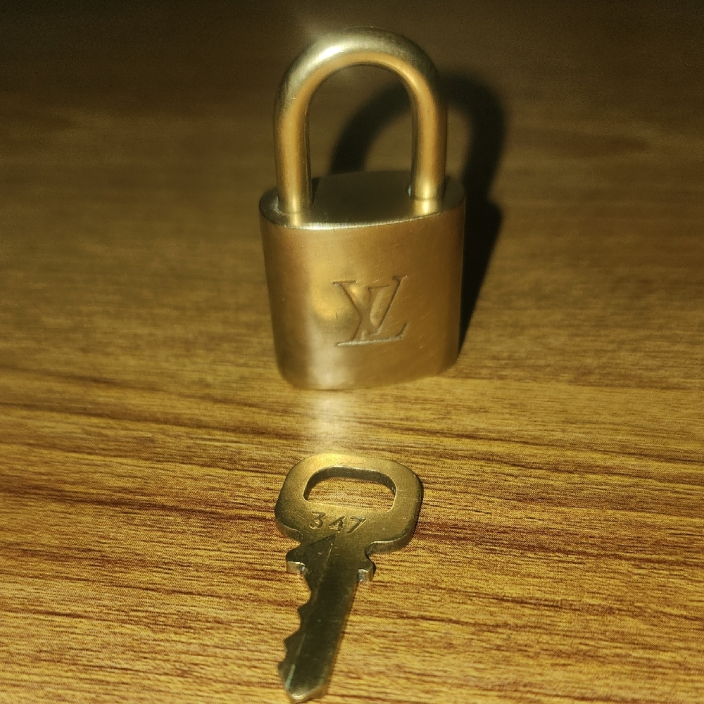 Louis Vuitton Gold Padlock and Key Set